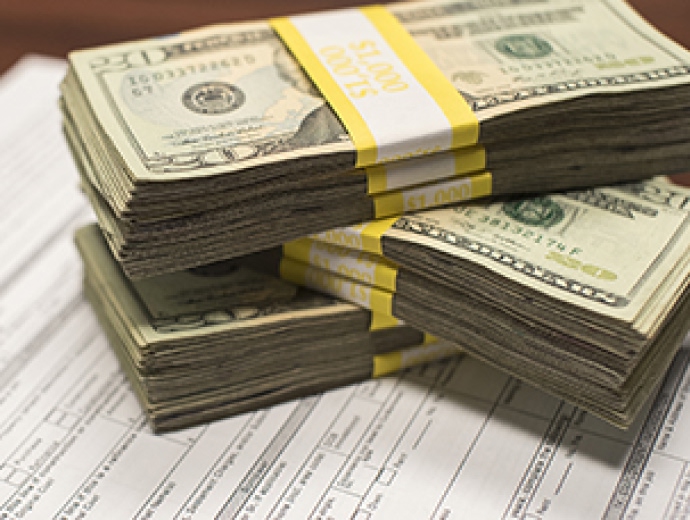 a stack of 20 dollar bills